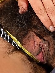 Gigi reveals her big hairy pussy lips